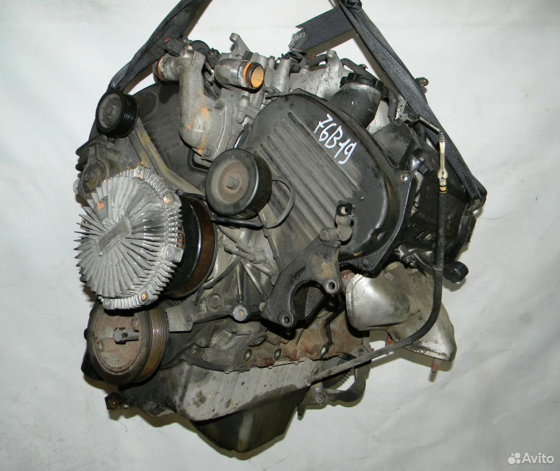 5. Фото двигателя 6g74 gdi. 5 мицубиси. 6g74 mpi dohc. Митсубиси паджеро 6g74 gdi.