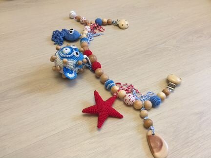 Вязанная растяжка для коляски или кроватки