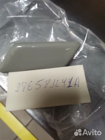 Крышка форсунки омывателя фары прав. V36