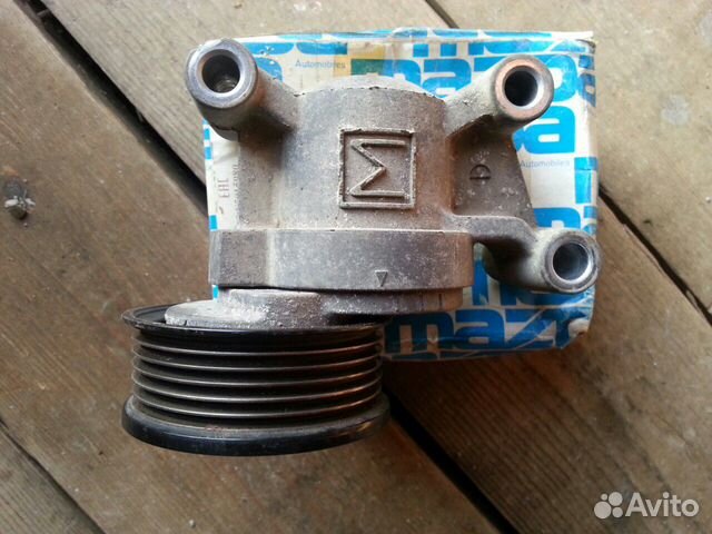 Натяжное устройство с роликом мазда,форд