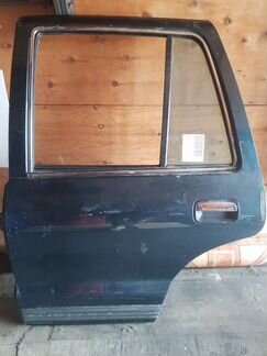 Задняя левая дверь на KIA sportage