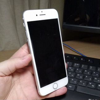 Телефон iPhone 7 silver 32g