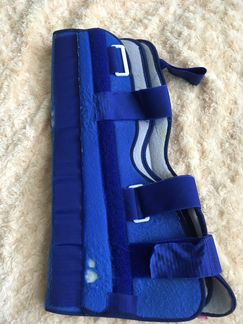 Коленный ортез жесткой фиксации