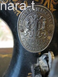 Старинная швейная машинка