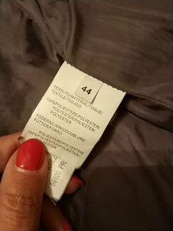 Тёплый жилет на девочку фиолетового цвета