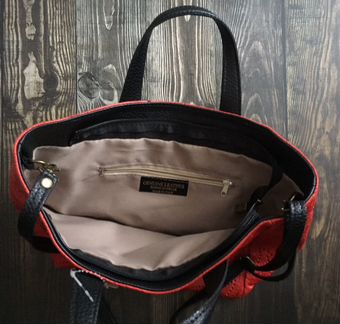 Сумка итальянская кожаная оранжевая с перфорацией