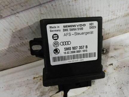 Блок управления адаптивной фарой Volkswagen Passat